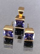 Earring and pendant set on 9ct Gold mounts with faceted Tanzanite Gemstones