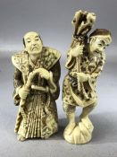 Two Similarly carved Chinese Figurines both with marks to base the tallest approx 14cm.