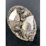 Two Mother of Pearl leaves mounted on an Oval Filigree silver Brooch approx 57mm