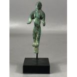 Luristan votive figurine modelled in bronze depicting a nude male figure with forearms extended,