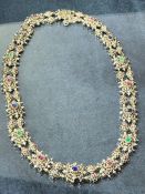Silver and Gold Victorian Necklace set with sixteen Gem stones comprising Ruby's, Emeralds and