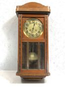 Wurttenberg oak wall clock, circa 1900, 14 day, gongs on the hour and half hour, good working order