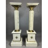 Pair of white marble plinths / pillars with gilt decoration, each approx 99cm in height