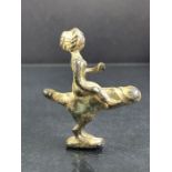Small bronze figure of a female riding a Phallus, height approx 5cm