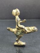 Small bronze figure of a female riding a Phallus, height approx 5cm