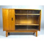 Mid Century bookcase with glass sliding doors and shelved cupboard, approx 107cm x 26cm x 82cm tall