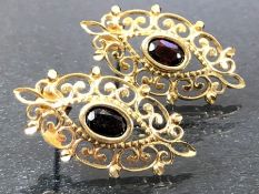 Pair of fully hallmarked 9ct Gold ornate earrings set with Garnets approx 25mm in length & total