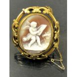 Victorian Gold metal Brooch with rotating central panel with photo frame on one side and a Cherub