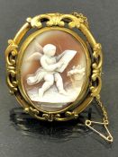 Victorian Gold metal Brooch with rotating central panel with photo frame on one side and a Cherub