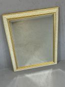 Modern gold and white mirror with lattice design to frame and bevel edge, approx 82cm x 60cm