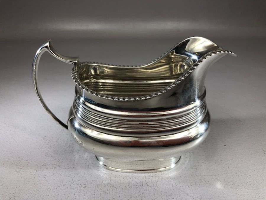 Hallmarked Silver tea set comprising large teapot sugar bowl and milk Hallmarked for Chester total - Image 2 of 16