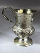 Victorian Silver Hallmarked cup with repousse floral decoration on pedestal foot London 1844 maker