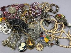 Collection of costume jewellery with beads, pendants etc
