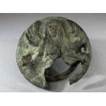 Bronze applique depicting the Gorgon Medusa, fragmented, approx 8cm in diameter