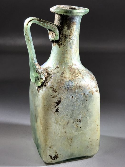 Square glass bottle, possibly Roman, in translucent blue/green glass, cylindrical neck very slightly - Image 11 of 11