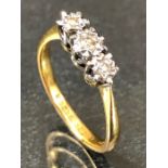 22ct Gold fully hallmarked three stone Diamond ring approx size 'J' & 2.6g