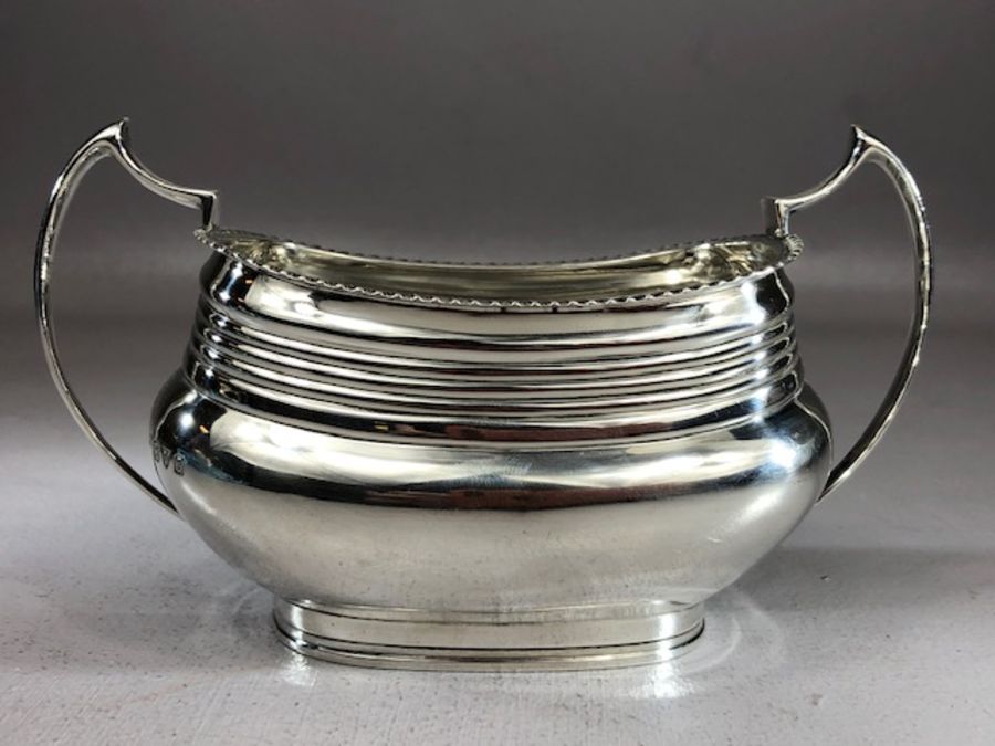 Hallmarked Silver tea set comprising large teapot sugar bowl and milk Hallmarked for Chester total - Image 6 of 16