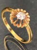 18ct Gold Diamond (approx .33ct) ring set in a raised starburst design size 'O'