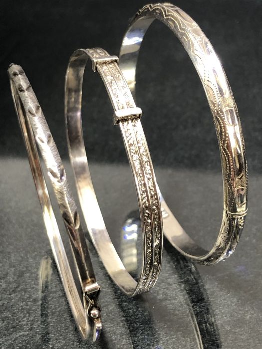 Three silver bangles - Image 2 of 5