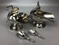 Two silver plated sugar servers each with sugar shovel