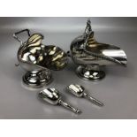 Two silver plated sugar servers each with sugar shovel