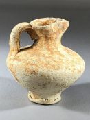 Small ceramic pottery wine jug / oenochoe, possibly Roman, with single handle, approx 7cm in height