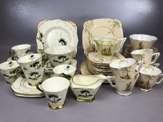 Collection of Art Deco tea ware: A Tuscan Plant part tea set in green, black and gilt to include six