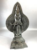 Large bronze figure of a multi-headed God, possibly Brahma, on stepped base, approx 39cm in height