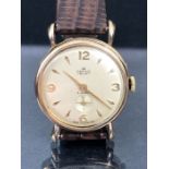 Vintage Wristwatch: 9ct Gold SMITHS Wristwatch circa 1950's with Champagne Dial and gold numerals