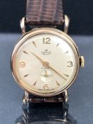 Vintage Wristwatch: 9ct Gold SMITHS Wristwatch circa 1950's with Champagne Dial and gold numerals