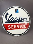 Circular enamel sign marked 'Vespa Service', approx 30cm in diameter