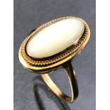 9ct Gold ring with a large (15mm across) white Opal size 'Q'