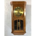 Brass faced wall clock, gongs on the hour and half hour, circa 1950s, working order