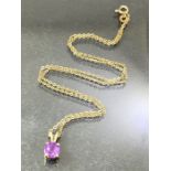 9ct gold chain approx 38cm long with a Hallmarked 9ct Gold pendant set with a faceted circular cut