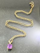 9ct gold chain approx 38cm long with a Hallmarked 9ct Gold pendant set with a faceted circular cut