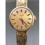 Wristwatch: A Tissot 9ct Gold Watch on 9ct Gold bracelet total weight approx 15g boxed with original