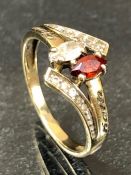 9ct Gold ring set with oval faceted stones size approx 'J'