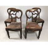 Set of four Victorian balloon backed dining chairs with leather seats