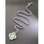 18ct White Gold Chain and 18ct White Gold Pendant set with square cut diamonds and circular diamonds