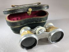 Boxed pair of French Opera Glasses by Deraisme with mother of Pearl detailing in leather case