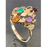 9ct Gold ring set with a variety of gem stones in a tiered design size 'U' total weight approx 2.