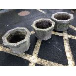 Set of three octagonal stone garden pots / planters, each approx 45cm in diameter x 32cm in height