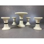 Mid Century / retro circular black and white table with four matching stools, in plastic, table