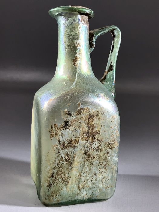 Square glass bottle, possibly Roman, in translucent blue/green glass, cylindrical neck very slightly - Image 4 of 11