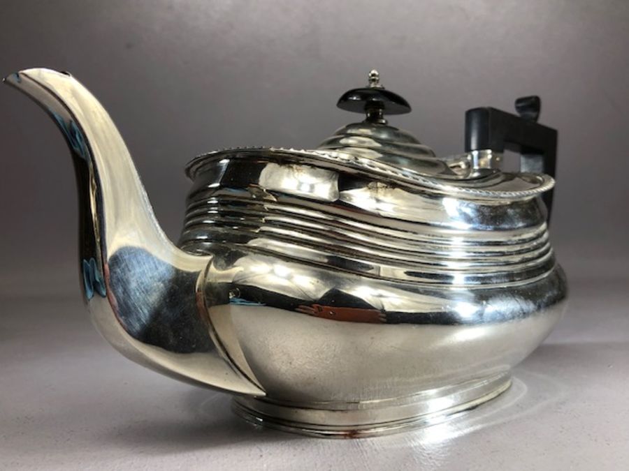 Hallmarked Silver tea set comprising large teapot sugar bowl and milk Hallmarked for Chester total - Image 14 of 16