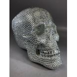 Interiors piece: decorative figure of a skull in reflective/glittered design, approx 25cm in length