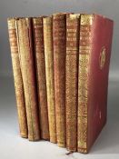 RUDYARD KIPLING - Set of seven red calf leather bound books to include The Day's Work, The Seven