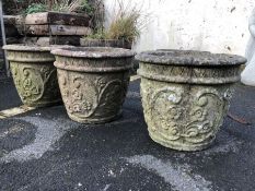 Set of three circular stone garden pots / planters, each approx 36cm in diameter x 31cm in height