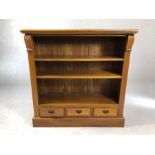 Modern solid wood bookshelf with three drawers under, approx 111cm x 37cm x 111cm tall