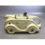 Sadler Art Deco OKT 42 racing car ceramic teapot in white and silver glazes, approx 23cm in length